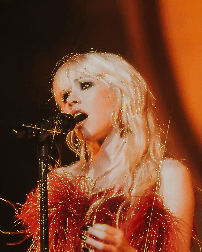 a glitterized picture of carly rae jepsen singing